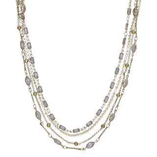 Multi-chain golden necklace with crystal details - Anton Heunis