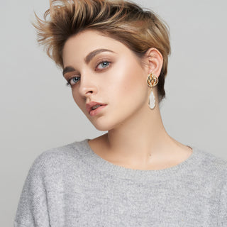 Golden knot earrings with crystal drop - Anton Heunis