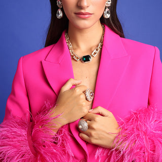 Gold chunky necklace with emerald centerpiece - Anton Heunis