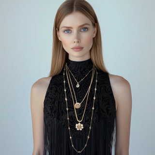 Anton Heunis - Set of four gold necklaces with charms