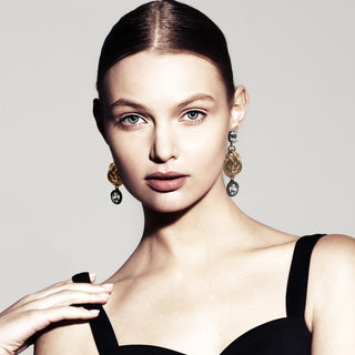 Golden knot earrings with gunmetal drops - Anton Heunis
