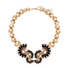 Statement gold necklace with bubbles and black crystal centerpiece - Anton Heunis