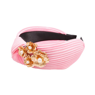 Pink tiara with golden details