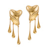 Golden liquid metal earrings with three long drops - Anton Heunis