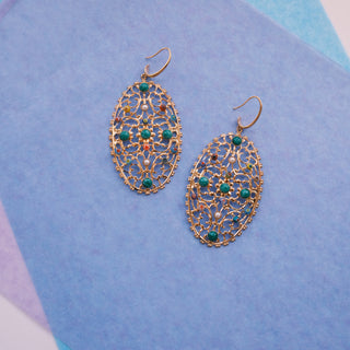 Golden net statement earrings adorned with beads Anton Heunis