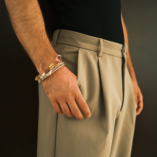 Man wearing a vintage rings mixed metals bracelet - Anton Heunis