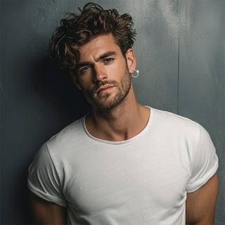 Man wearing silver hoop earrings with crystal detail - Anton Heunis