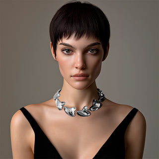 Model wearing Silver liquid metal statement chunky necklace - Anton Heunis