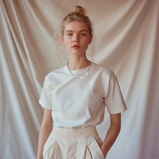 Model wearing Silver necklace with three crystal floral details - Anton Heunis