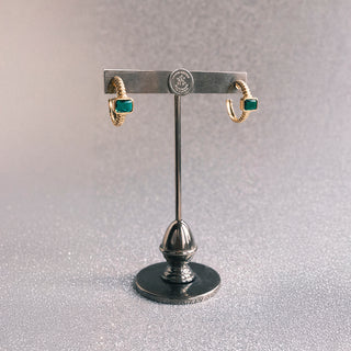 Pair of golden earrings with emerald green detail - Anton Heunis