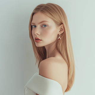 Woman Wearing Drop earrings with dainty stones and carnelian squared stone - Anton Heunis Handmade Jewelry