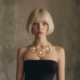 Woman Wearing Beige stone in golden statement necklace - Anton Heunis