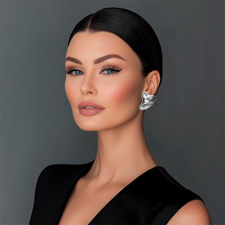Woman wearing Silver liquid metal statement earrings - Anton Heunis